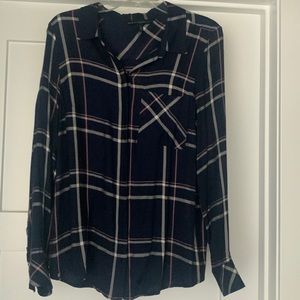 Long sleeve shirt with collar.  Navy with cream and pink lines.